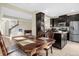 Dining area with wooden table and chairs in front of the kitchen at 2261 Brookridge Trl, Sanford, FL 32773
