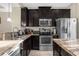 Kitchen featuring stainless steel appliances and granite countertops at 2261 Brookridge Trl, Sanford, FL 32773