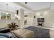 Open-concept living area with tile flooring, neutral walls, and a clear view into the kitchen at 2261 Brookridge Trl, Sanford, FL 32773