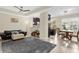 Open-concept living area and dining space featuring tile floors and neutral colors at 2261 Brookridge Trl, Sanford, FL 32773