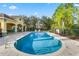 Community pool with surrounding mature landscaping at 2261 Brookridge Trl, Sanford, FL 32773