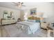 Comfortable bedroom with wooden furniture and a decorative headboard at 235 S Shadowbay Blvd, Longwood, FL 32779