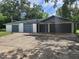 Detached garage featuring multiple bays and an attached carport at 2417 Yale Ave, Sanford, FL 32771