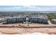 Aerial view of the condo buildings with an ocean view and beach access at 2700 Ocean Shore Blvd # 515, Ormond Beach, FL 32176
