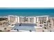 Exterior aerial view of the condo buildings with an ocean view at 2700 Ocean Shore Blvd # 515, Ormond Beach, FL 32176