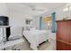 Comfortable bedroom featuring neutral decor and a bright window view at 2700 Ocean Shore Blvd # 515, Ormond Beach, FL 32176