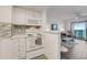 Bright kitchen connected to a living room with ocean view at 2700 Ocean Shore Blvd # 515, Ormond Beach, FL 32176