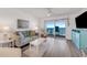 Inviting living room with a relaxing ocean view from the balcony at 2700 Ocean Shore Blvd # 515, Ormond Beach, FL 32176