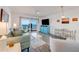 Comfortable living room with balcony access and beautiful ocean views at 2700 Ocean Shore Blvd # 515, Ormond Beach, FL 32176