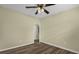 Bedroom with wood flooring and a ceiling fan at 3016 Rogan Rd, Orlando, FL 32812