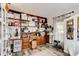 Office with hardwood floors, custom built-ins, a rolling chair, and lots of natural light at 3237 Newmark Dr, Deltona, FL 32738