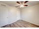 This bedroom features modern vinyl flooring and a ceiling fan with lights at 3354 Summerdale Way, Kissimmee, FL 34746