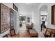 Spacious living room with a ceiling fan, sliding glass doors, and views of the backyard at 340 Pheasant Dr, Haines City, FL 33844