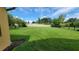 Large, well-maintained backyard with lush green grass and privacy fence at 340 Sorrento Rd, Kissimmee, FL 34759