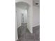 Hallway featuring neutral walls and carpeted flooring at 340 Sorrento Rd, Kissimmee, FL 34759