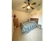 Cozy bedroom with ceiling fan, carpet flooring, and natural light at 3539 Maple Ridge Loop, Kissimmee, FL 34741