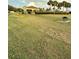 Enjoy the outdoors in this community common area with grassy field and outdoor grill at 3539 Maple Ridge Loop, Kissimmee, FL 34741