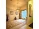Traditional dining room featuring a modern light fixture and patterned rug at 3539 Maple Ridge Loop, Kissimmee, FL 34741