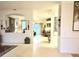Bright foyer showcasing the tile flooring and open layout of the home at 3539 Maple Ridge Loop, Kissimmee, FL 34741