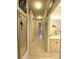 Hallway featuring tile floors and neutral colored walls and trim at 3539 Maple Ridge Loop, Kissimmee, FL 34741