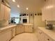 Spacious kitchen featuring tile floor and plenty of counter space at 3539 Maple Ridge Loop, Kissimmee, FL 34741