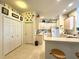 Well-equipped kitchen with modern appliances and tile flooring at 3539 Maple Ridge Loop, Kissimmee, FL 34741
