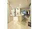 Bright and open kitchen with a breakfast bar and seamless access to living spaces at 3539 Maple Ridge Loop, Kissimmee, FL 34741