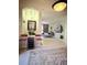 Open-concept living area showcasing elegant archways, stylish seating, and tasteful decor at 3539 Maple Ridge Loop, Kissimmee, FL 34741