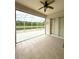 Enjoy serene views from this tiled and screened patio overlooking a peaceful lake at 3539 Maple Ridge Loop, Kissimmee, FL 34741