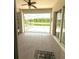 Enjoy lake views from the tiled and screened lanai, complete with convenient patio access at 3539 Maple Ridge Loop, Kissimmee, FL 34741
