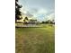 Enjoy outdoor fun at this playground with grassy field, swings, and shady trees in this community at 3539 Maple Ridge Loop, Kissimmee, FL 34741