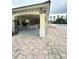 This community pool has an outdoor shaded seating area for residents to relax and enjoy at 3539 Maple Ridge Loop, Kissimmee, FL 34741