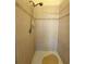 Walk in shower with tile surround and convenient shower head at 3539 Maple Ridge Loop, Kissimmee, FL 34741