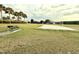 Get some exercise on the sand volleyball court or enjoy a BBQ in this grassy common area at 3539 Maple Ridge Loop, Kissimmee, FL 34741