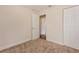 Clean, carpeted bedroom with a closet at 4 Kasey Dr, Orlando, FL 32807