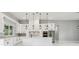 A modern kitchen features a large island with white countertops and stainless steel appliances at 42157 Tamarac St, Eustis, FL 32736