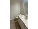 Bathroom featuring a toilet and a vanity with neutral paint and tile floors at 454 Wilton Cir, Sanford, FL 32773