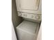 Laundry area featuring a stacked washer and dryer, and appliances at 454 Wilton Cir, Sanford, FL 32773