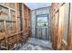 Bathroom showcasing cinder block walls and window, offering renovation potential at 535 Romano Ave, Orlando, FL 32807