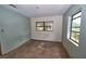 Bedroom showing natural light from windows, awaiting personalized updates and flooring at 535 Romano Ave, Orlando, FL 32807
