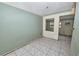 Bedroom showcasing ceramic tile flooring, and an open doorway at 535 Romano Ave, Orlando, FL 32807