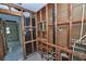 Open kitchen design with exposed wooden framing, plumbing and electrical offering customization options at 535 Romano Ave, Orlando, FL 32807