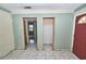Spacious living room with ceramic tile flooring and open layout to other rooms at 535 Romano Ave, Orlando, FL 32807