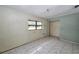 Room featuring tile floors and large window, ready for renovation to suit your needs at 535 Romano Ave, Orlando, FL 32807