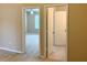 View from the bedroom showcases seamless transitions to the connected bathroom and closet at 650 Shropshire Loop, Sanford, FL 32771