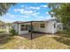 Exterior view of house and patio at 814 Roseapple Ave, Lady Lake, FL 32159