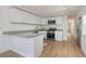 Contemporary kitchen with granite countertops, and stainless steel appliances at 814 Roseapple Ave, Lady Lake, FL 32159