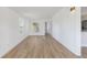 Living room featuring laminate flooring and lots of natural light at 814 Roseapple Ave, Lady Lake, FL 32159