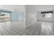Open living space with tiled flooring and window facing the front yard at 830 Hawkes Ave, Orlando, FL 32809