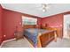 Bedroom with a ceiling fan, large window and lots of dresser space at 909 Hendon Place, Kissimmee, FL 34758
